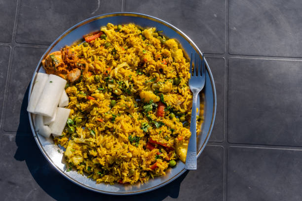 istock Authentic Indian Pulao: Colorful Vegetable Rice Platter Garnished with Fresh Coriander - Traditional Cuisine Stock Footage 2047602207