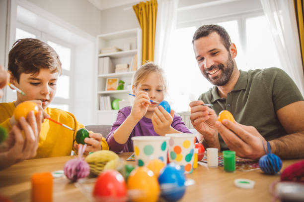 istock Family preparing Easter at home 2047616595