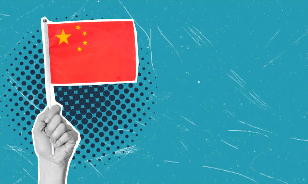 istock Art collage, Hand with Chinese flag on blue background. 2047616599