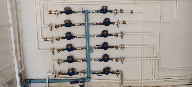 many water meters as a water distribution station in a large residential building