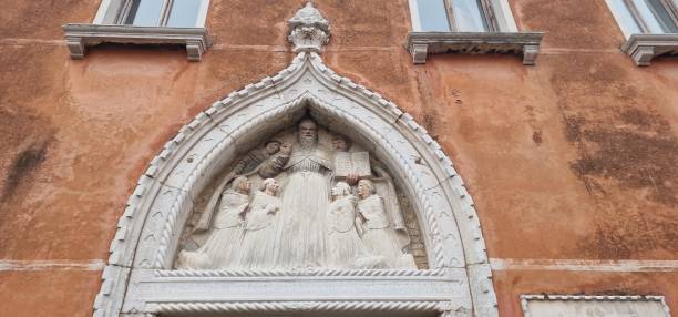 istock Venice with a facade decoration depicting the saint 2047626941