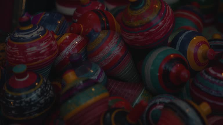 Closeup shot of piled-up colorful mud pots.
