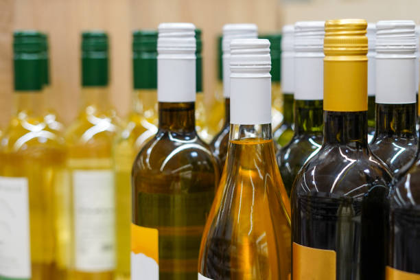 istock assortment of various wine bottles in the grocery store 2047643407