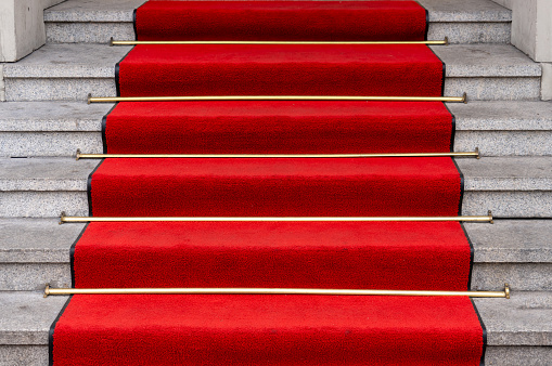 Germany, Berlin, February 24, 2024 - Red carpet on steps, Berlin Charlottenburg
