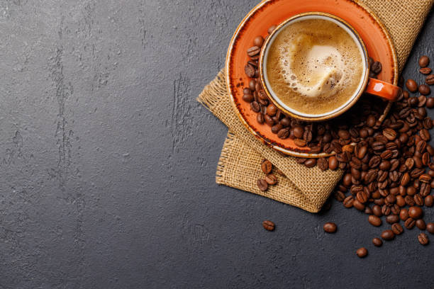 istock Roasted coffee beans and espresso coffee cup 2047658905
