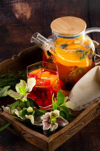 istock Fruit red tea with berries in glass tea cup 2047675994