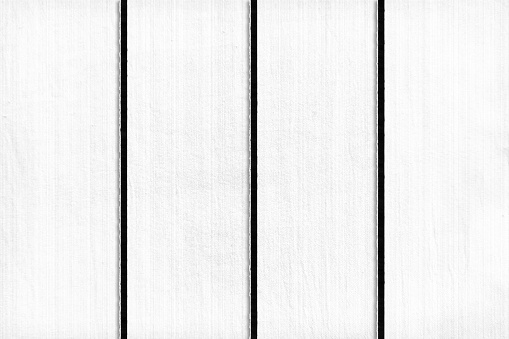 Three Smudged black color stripes of paint leaving copy space white wooden texture background with wood grain. Apt for abstract modern art backdrops, wallpaper, artistic slides templates
