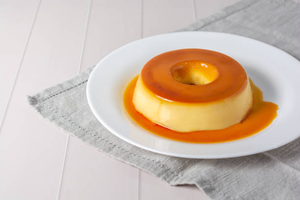 istock Close-up of brazilian pudding, traditional dessert over table 2047720401