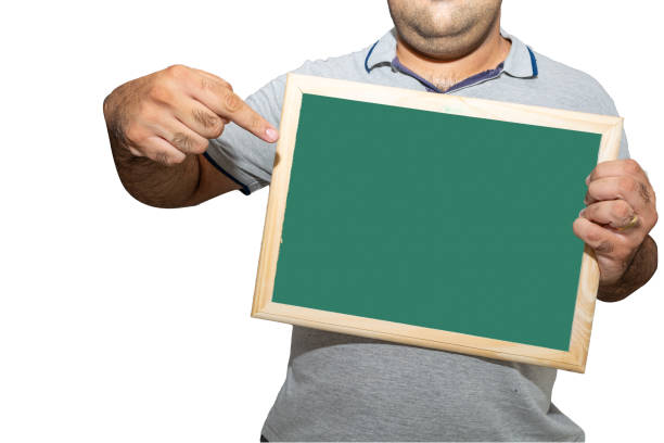 istock Man holding blank school blackboard sign on a white background 2047720904