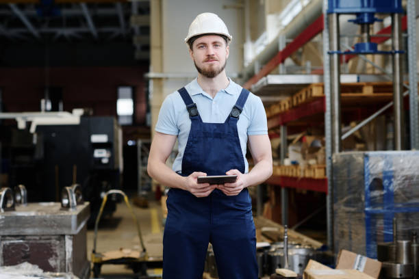 istock Young Male Factory Worker With Digital Tablet 2047728889