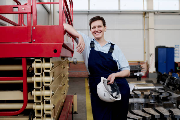istock Cheerful Female Engineer At Work In Factory 2047731552