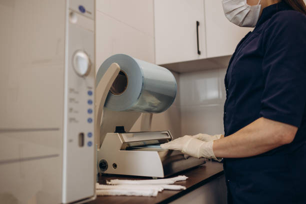 istock Medical sterilization packaging machine and roll pack for sterilized dental instruments. 2047735297