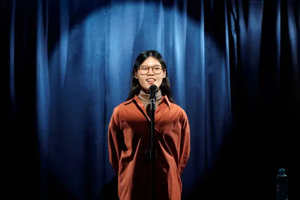 Photo of Young Chinese female comedian on stage