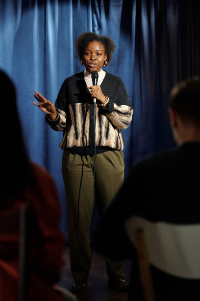 istock Comedian on stage in front of audience 2047765661