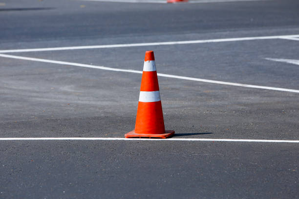 istock An orange traffic cone on the road. 2047782341