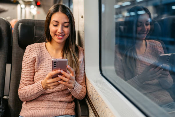 istock Young Woman Using Phone On The Train In Copenhagen In Denmark 2047791538