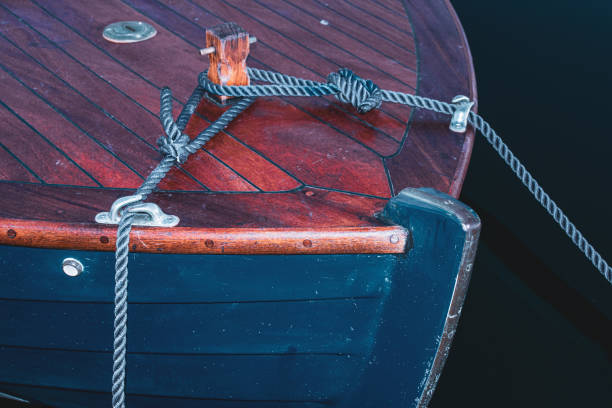 istock Boat anchored in water with ropes and a secure knot 2047818378