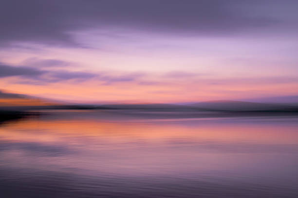 istock Scenic sunset over a tranquil lake 2047818391