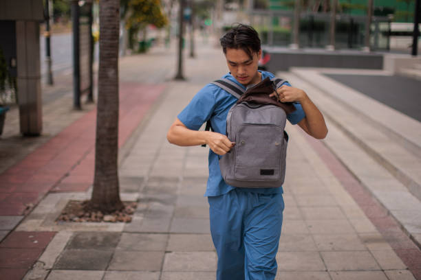 istock Male nurse walking to work 2047818917