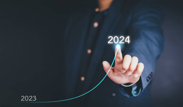 istock Successful businessman activates virtual button with touch technology 2024 2047828047