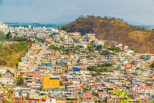 Guayaquil, Ecuador November 7 2021: Many rustic poor houses over hill, guayaquil city, guayas, ecuador