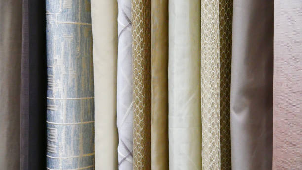 Close-up of many different curtains or tablecloths