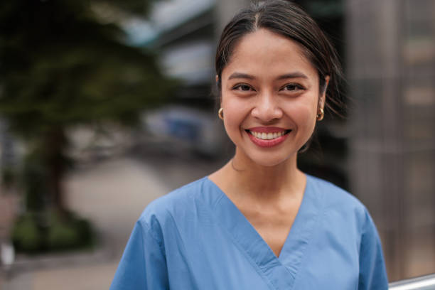 istock Beautiful female nurse 2047838050