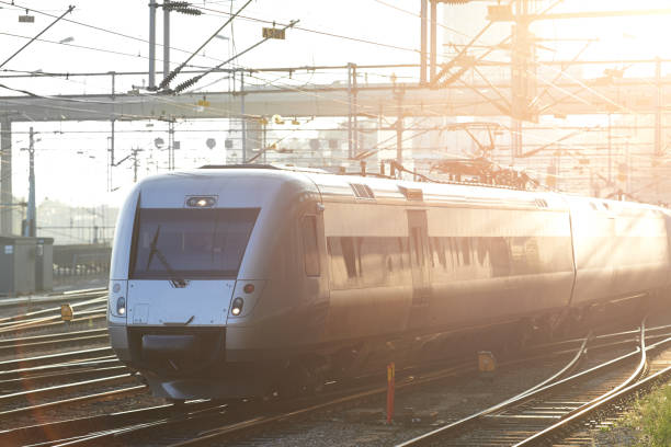 istock A pasenger train on the railroad tracks in Scandinavia 2047848253