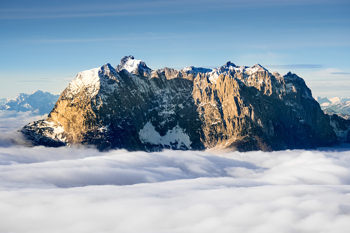 The Grenzgletscher above the clouds of the Swiss Alps from Gornergrat, Switzerland.