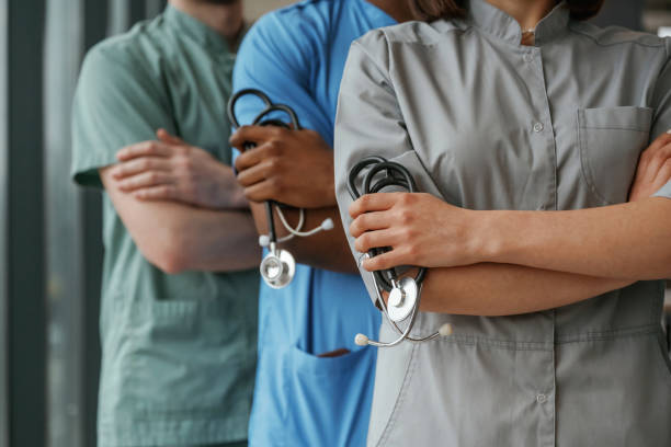 istock With stethoscope. Group of doctors are together indoors 2047874925