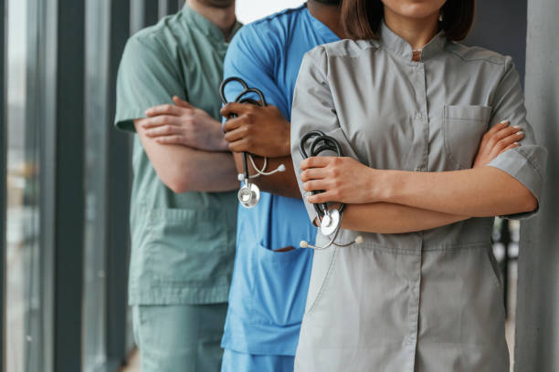 istock With stethoscope. Group of doctors are together indoors 2047874936