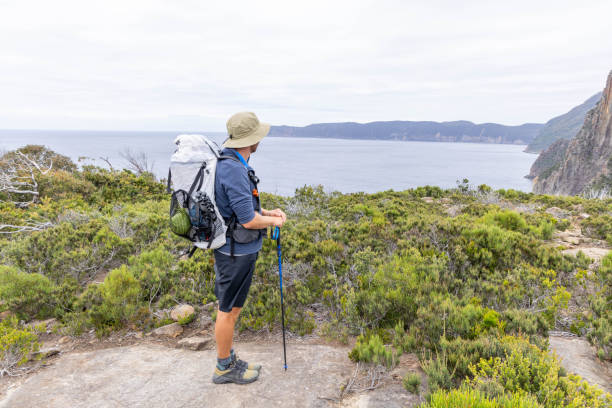 istock Young man hiking in Tasmania, Australia 2047900558