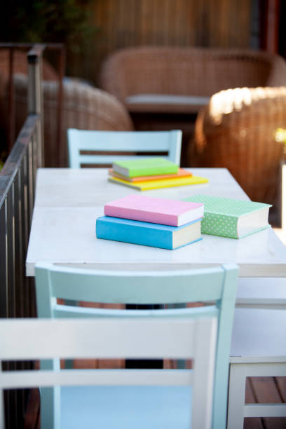 Table and chairs with books, back to school