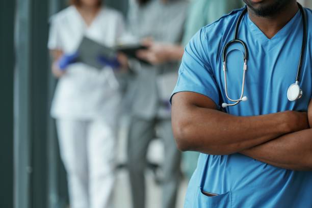 istock With stethoscope. Group of doctors are together indoors 2047903005