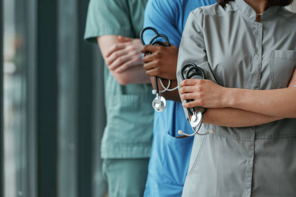 With stethoscope. Group of doctors are together indoors