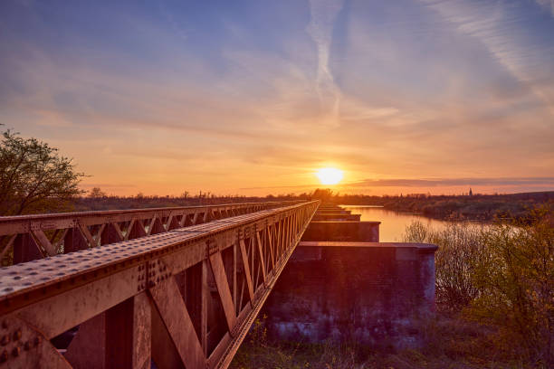 Moerputten old railway bridge in Den Bosch, The netherlands during sunset.