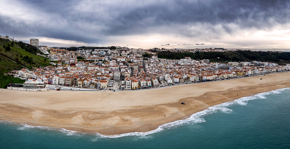 Panorama drone view of cliff and lighthouse in Nazare, Portugal, where the largest wave was surfed