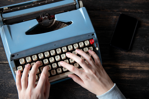 Typing on old typewriter