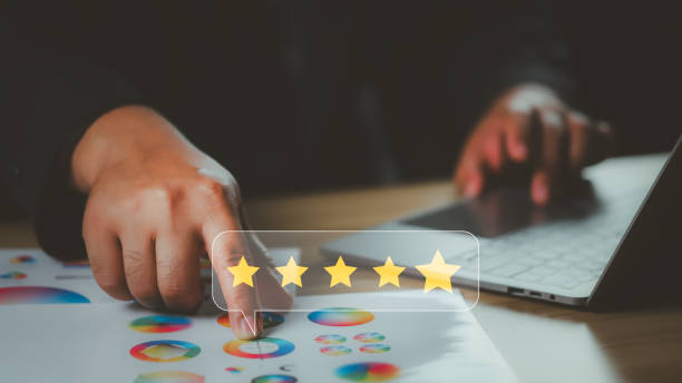 istock Customer service and Satisfaction concept ,Business people are touching the virtual screen on the happy Smiley face icon to give satisfaction in service, rating very impressed. 2047926893