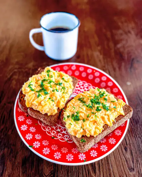 Photo of Nutritive breakfast with scrambled egg toast