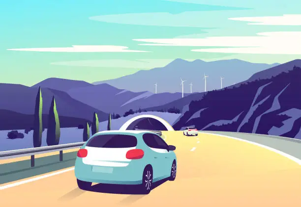 Vector illustration of Vector illustration with cars driving along a curving road along the mountains with wind turbines