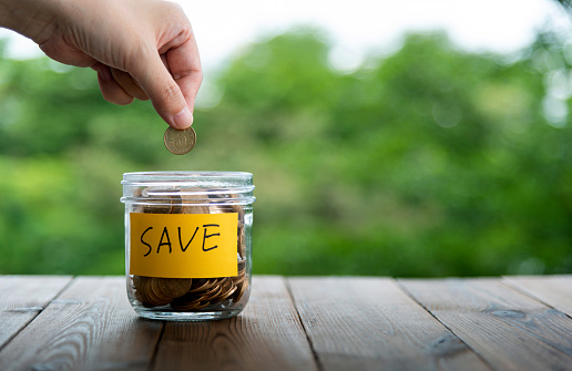 Coin jar with save label