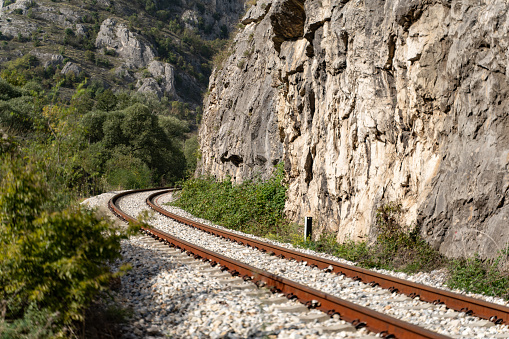 Railway tracks on the rocky mountains in Serbia.