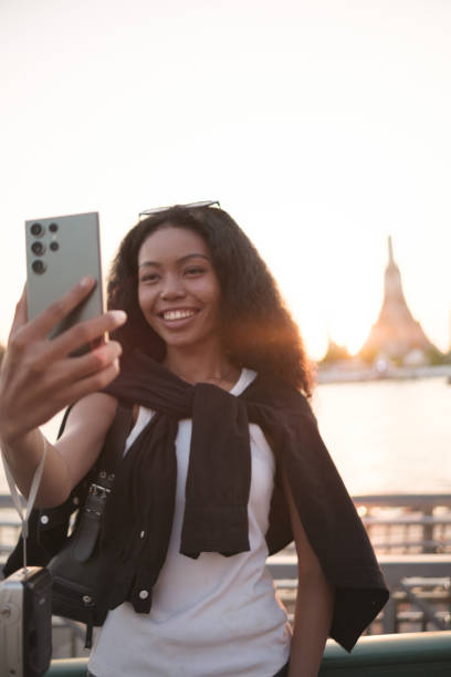 istock Asian woman enjoy travel in  downtown district 2047999708