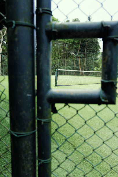 istock Tropical Tennis: Desolate Tennis Court on an Empty Island 2048021855