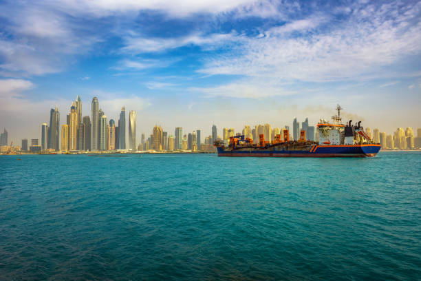 Large cargo ship sailing to the Dubai marina port
