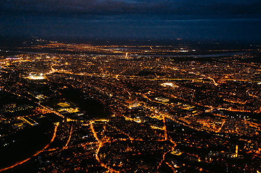 View from the airplane window mid air at night, above Belgrade in Serbia.