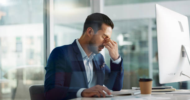 istock Business man, headache and tired on computer for information technology, online planning and office stress. Worker, programmer or developer with fatigue, pain or frustrated for mistake on desktop 2048086903