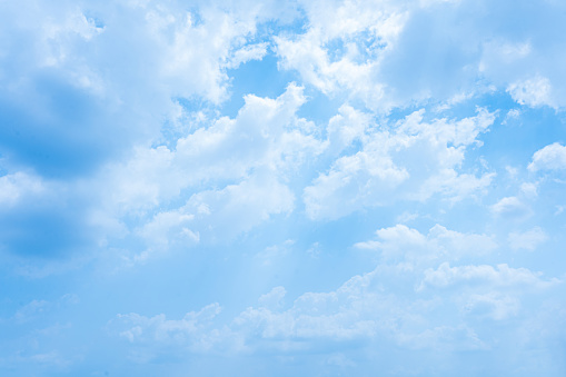 Clear Summer Sky with Beautiful Fluffy Clouds and Bright Blue Atmosphere