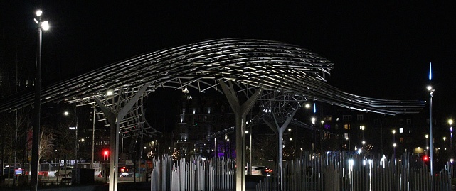Night shot showing the metal frame of the Tay Whale sculpture in Dundee, Scotland
